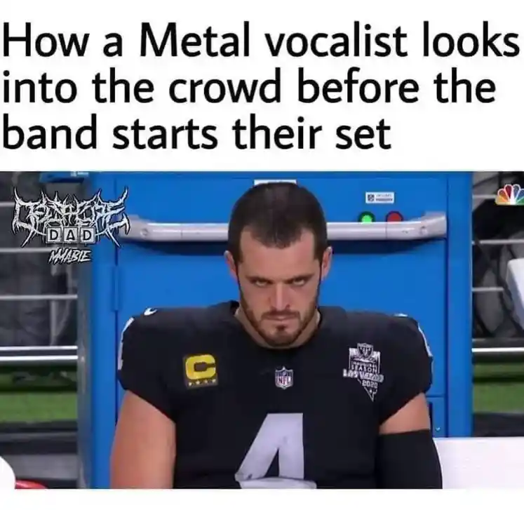 Metal vocalist meme glaring at crowd before set