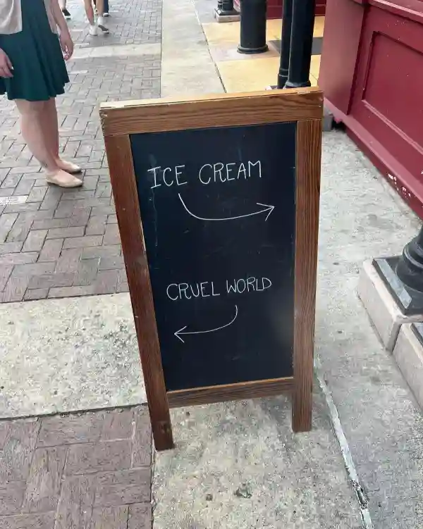 Ice cream cruel world meme points opposite ways