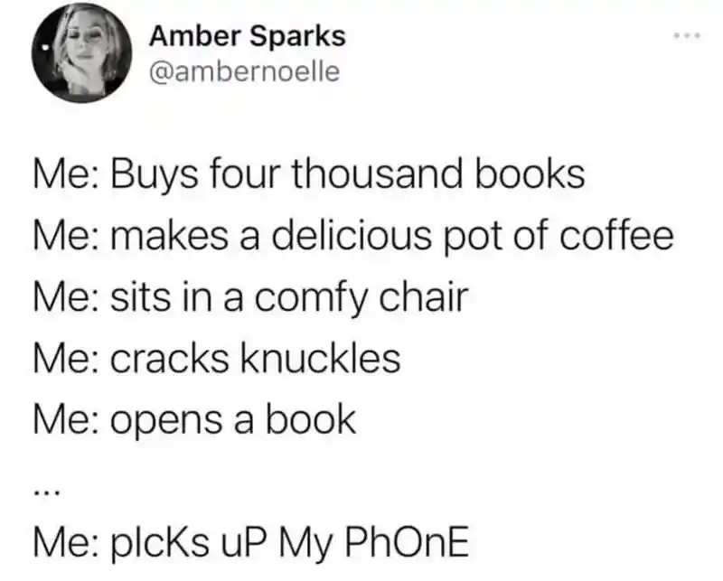 Book lover meme grabs phone to avoid reading
