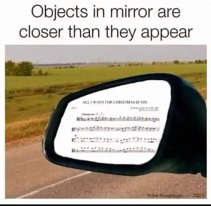 All i want for christmas meme in car side mirror