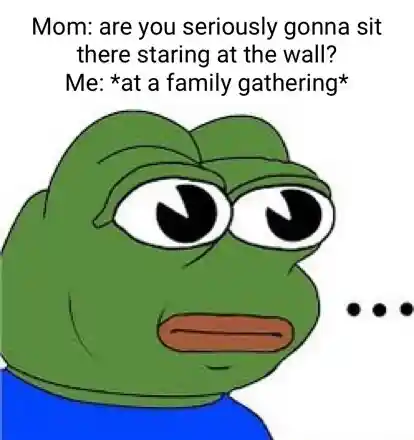 Sad frog meme staring blankly at family gathering