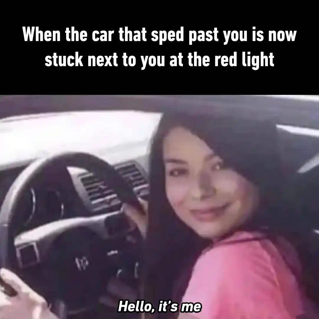 Speeding car red light meme smiling smugly