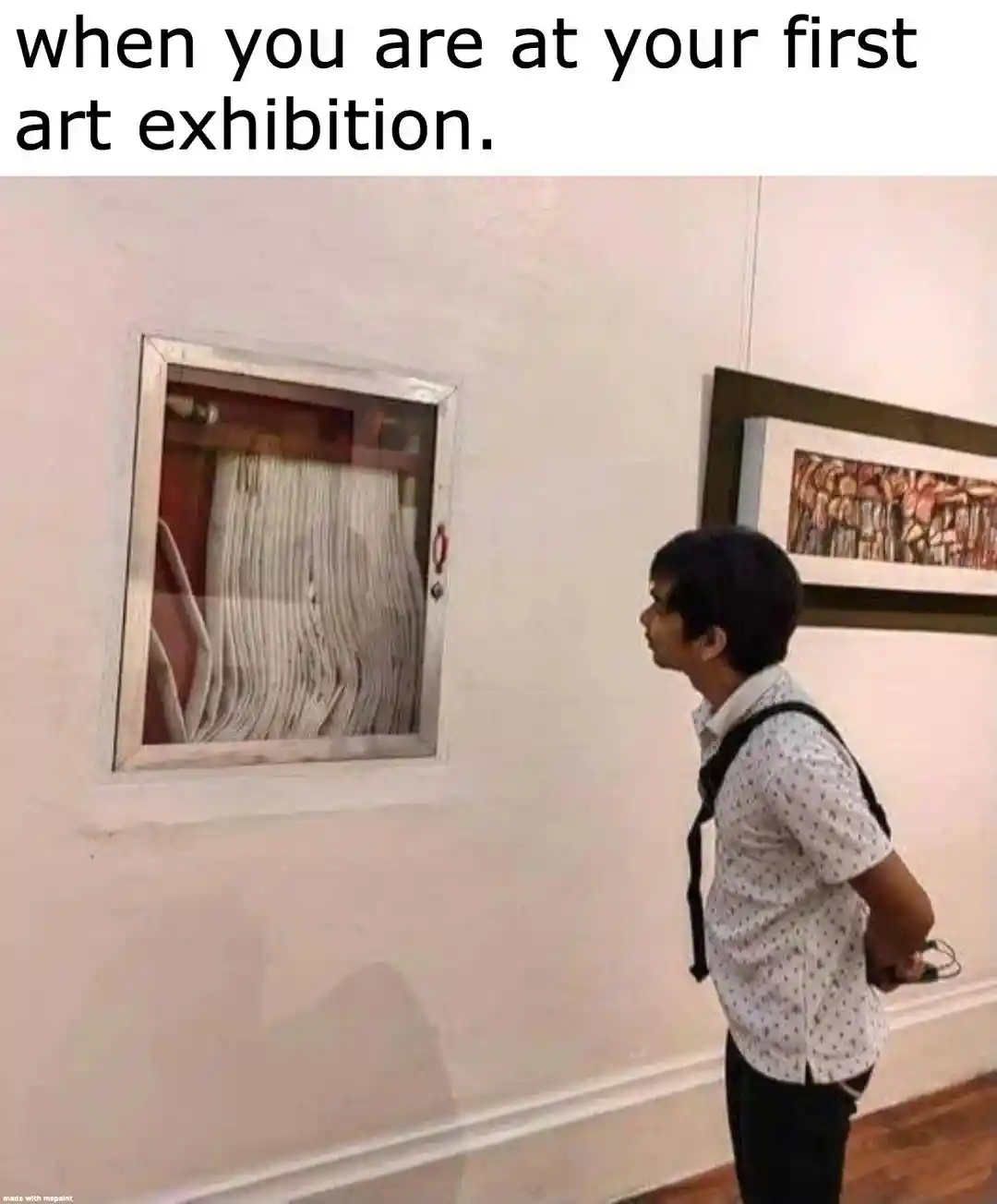 Art exhibition meme staring at fire hose