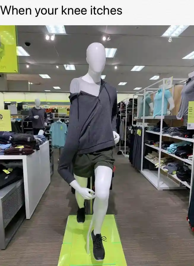 Knee itch mannequin meme scratches knee in store