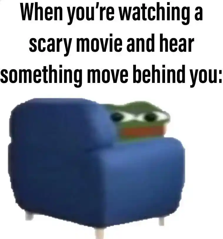 Scary movie meme hiding behind couch
