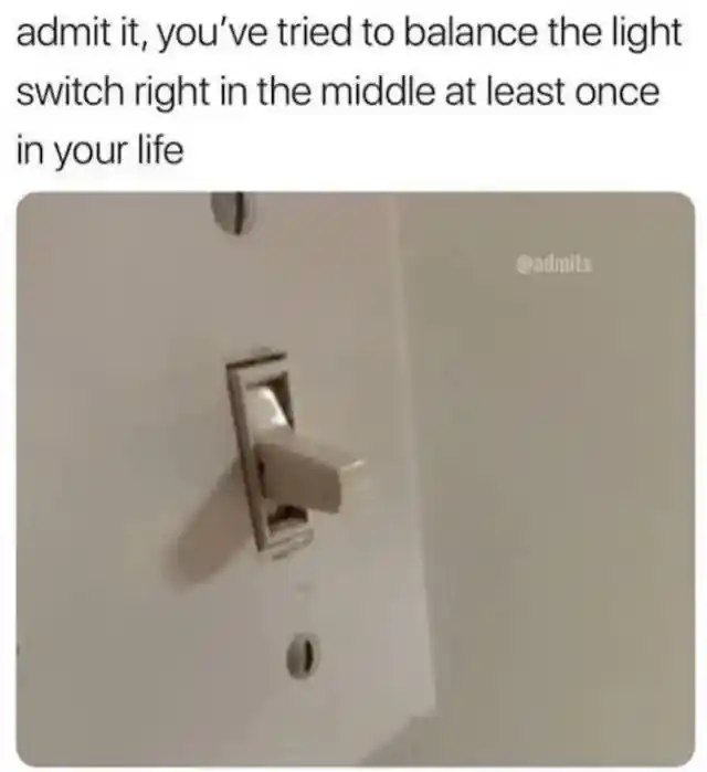Light switch meme balancing it halfway
