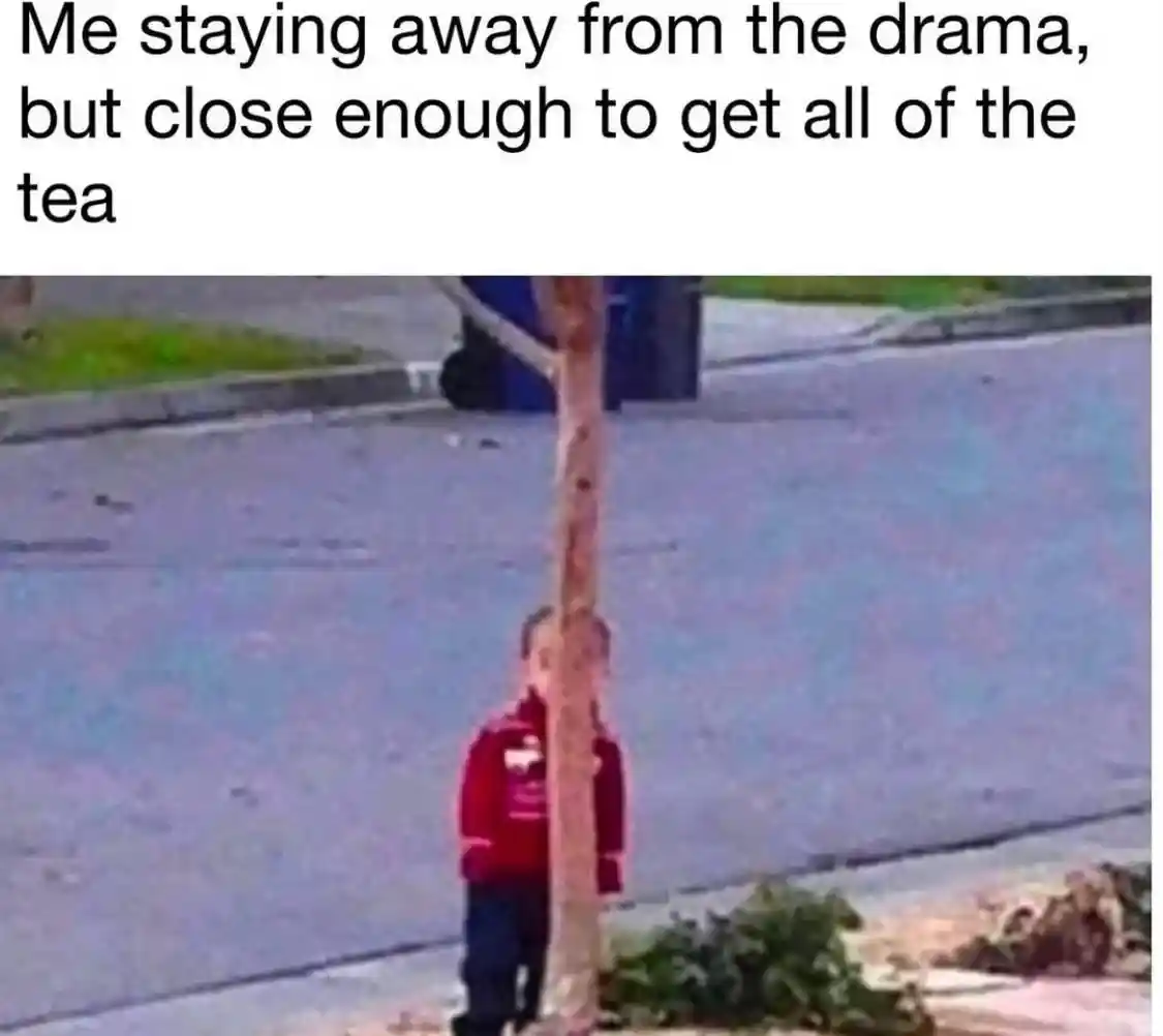 Drama tea meme hiding behind tree