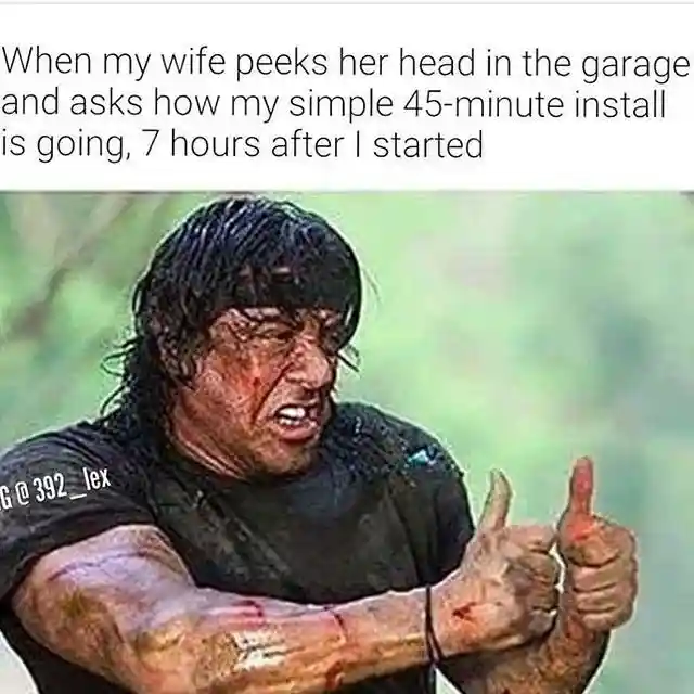 Thumbs up rambo meme reacts to wife in garage