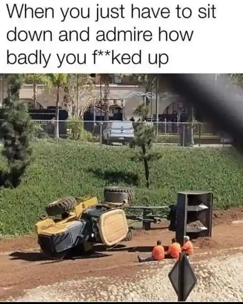 Flipped truck meme workers admiring their mess