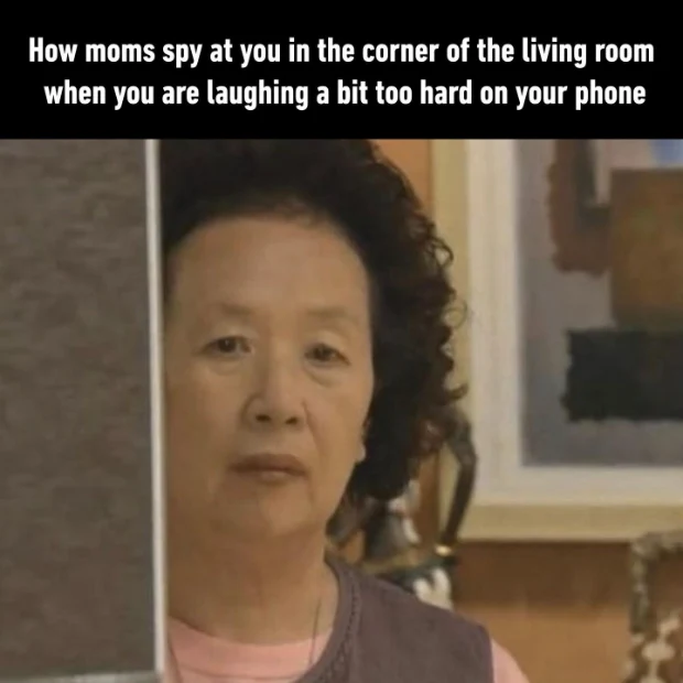 Sneaky mom meme peeking at you laughing on your phone